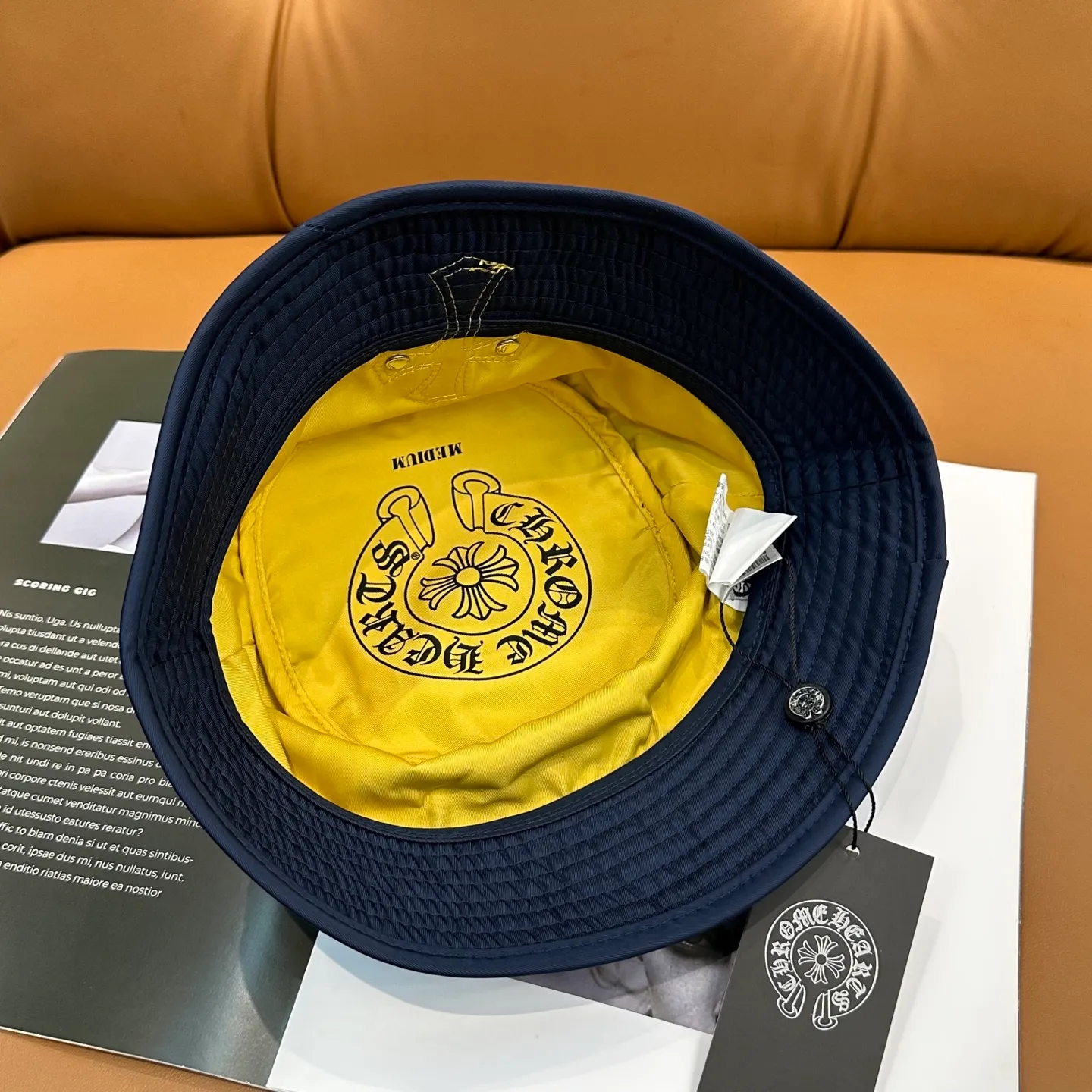 P70 Chrome Hearts CH Crank Bait Navy leather cross fisherman hat, same style for men and women. Custom-woven and dyed navy blue and yellow nylon fabrics, hand-cut imported colorless yellow crosses, and 925 silver scrolls.